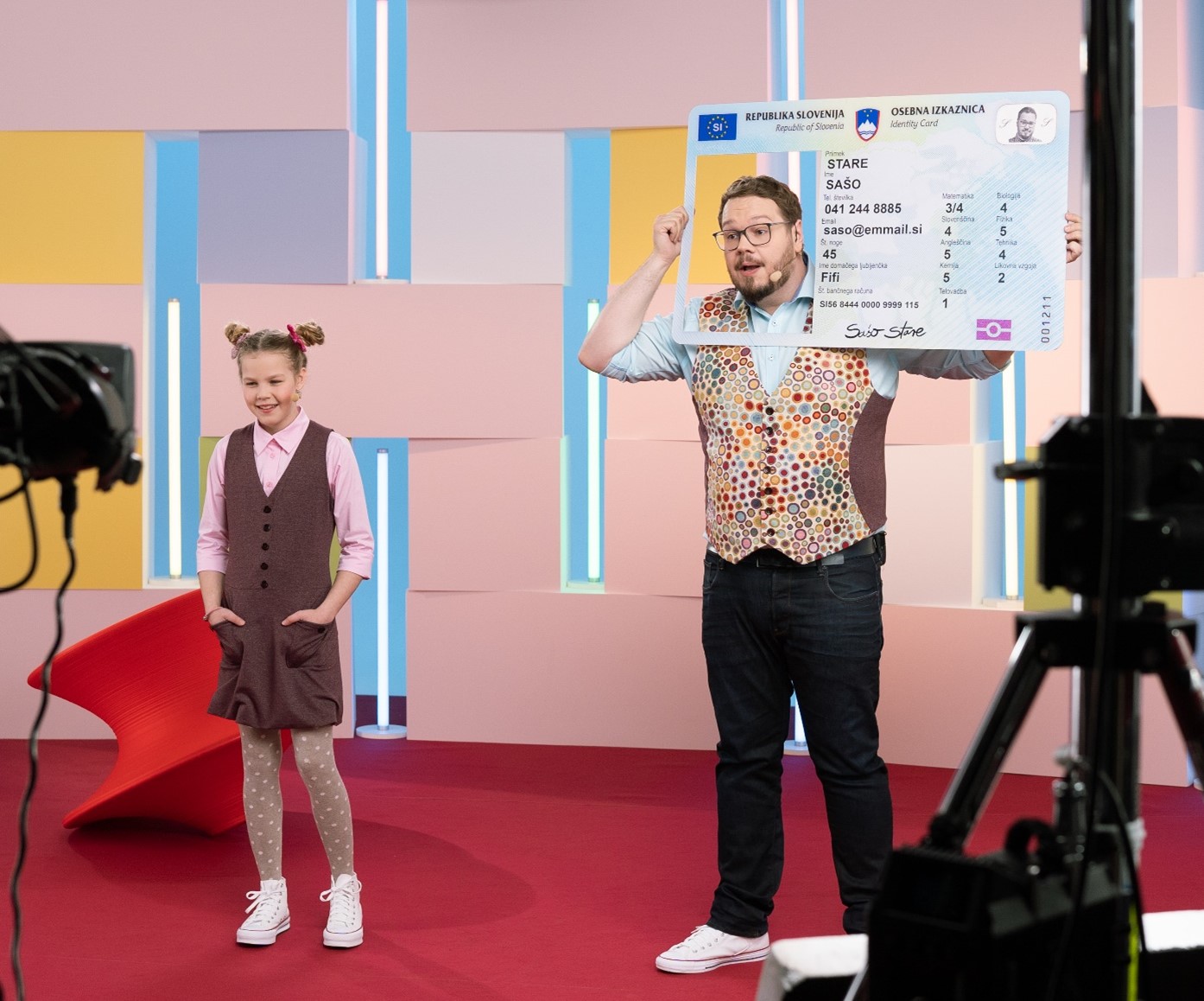 Host and child being recorded on the talk show.